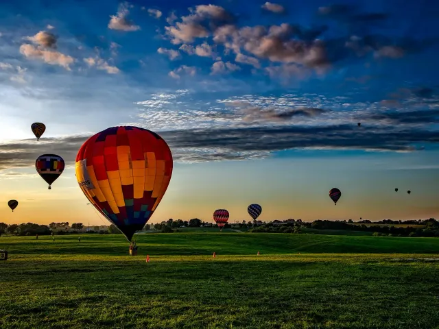 Hot air balloon floating at sunrise