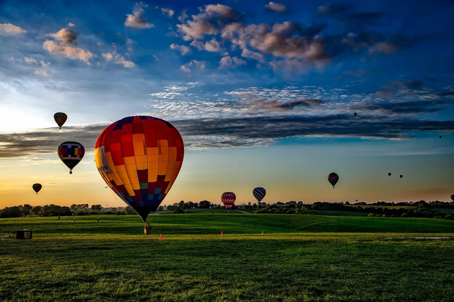 Hot air balloon floating at sunrise